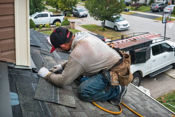 Professional Gutter Installation technician working in Bonita Springs, FL